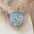 Close-up of heart-shaped blue glitter phone grip with handmade metal tag on gift card - Magnetic Heart Style / Blue