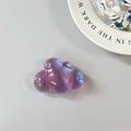 Macro detail of iridescent laser cloud phone grip with vibrant holographic finish - Adhesive Cloud / Purple