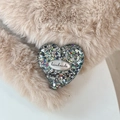 Close-up of a sequin heart-shaped grip with a metallic plate engraved with handmade - Standard Adhesive Style / Black