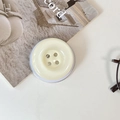 Close-up of a cream-yellow button-shaped phone grip on a minimalist background - Magnetic Large Button / Crystal Solid Color-Off-White