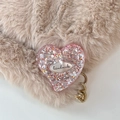 Close-up of pink glitter heart phone grip featuring a handmade label on plush background - Standard Adhesive Style / Red
