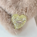 Close-up of yellow glitter heart phone grip with an engraved handmade metal tag - Standard Adhesive Style / Yellow