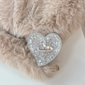 Macro detail of heart-shaped glitter phone grip with a silver handmade metal plate - Standard Adhesive Style / Silver