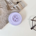 Close-up of a lilac button-shaped phone grip on a minimalist magazine background - Magnetic Large Button / Crystal Solid Color-Light Purple