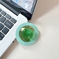 Close-up of a mint green magnetic phone socket with a faceted green gemstone detail - Dark Green