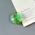 Close-up of green multifaceted diamond cut phone grip on a minimalist grey background - Adhesive-Large Round Rhinestone-Green