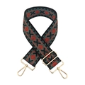 Close-up of geometric diamond jacquard strap with vintage red, green, and gold metal clasps - 34-Black Red Brown Green