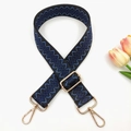 Detail of 3.8cm adjustable jacquard strap with geometric pattern and gold hardware - Black with Blue