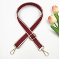 Detail of red and white geometric woven bag strap with golden metal swivel hooks - Wine Red Beige Edge