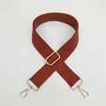 Close-up of brown woven replacement bag strap with polished gold metal buckles - Brown