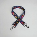 Detail of bohemian geometric woven purse strap with matte black metal swivel hooks - Film Strip Gunmetal Buckle
