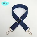 Detail of navy blue nylon bag strap with adjustable gold buckle and swivel hooks - Blue
