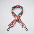 Adjustable woven shoulder strap for bags with orange and red ethnic geometric patterns - Dazzle Gunmetal