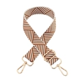 Close-up of brown and white geometric woven bag strap with golden metal lobster clasps - Camel & White