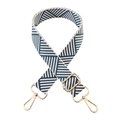 Close-up of 3.8cm blue and white geometric woven strap with gold metal buckle - Blue White