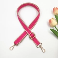 Detail of adjustable rose pink woven bag strap with geometric pattern and gold clips - Rose Red and Beige Edge