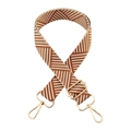 Detail of adjustable woven bag strap with brown chevron pattern and gold metal hardware - Rice Camel