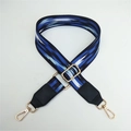 Detail of blue and black woven bag strap with golden metal swivel hooks and adjuster - Blue Colorful Clouds With Black Leather End