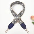 Detail of woven bag strap with diamond pattern and gold-tone lobster clasps - Beige Dark Blue + Blue Leather