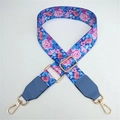 Close-up of blue floral wide strap with golden metal hooks and leather reinforced ends - Blue Flower With Lake Blue Leather End