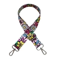 Detail of adjustable wide canvas bag strap with colorful daisy floral print and silver clips - Floral with Silver Buckle