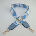 Close-up of geometric patterned replacement bag strap with golden metal lobster clasps - Blue White Grid + Light Blue Leather