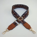 Detail of adjustable leopard print bag strap with golden metal hooks and brown faux leather - Leopard + Brown Leather