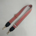 Adjustable geometric woven bag strap with orange and purple patterns and gold hooks - Orange