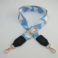 Detail of adjustable geometric triangle shoulder strap with gold metal lobster clasps - Blue White Grid + Black Leather