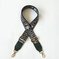 Close-up of vintage floral embroidery on dark green bag strap with gold metal hooks - Floral Print (Green)