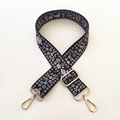 Detail of adjustable floral embroidery bag strap with premium gold lobster clasps - Silver Clasp / Floral