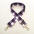 Detail of adjustable purple and pink plaid purse strap with polished gold metal lobster clasps - Time Grid
