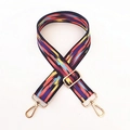 Macro shot of colorful bohemian woven purse strap with gold metal lobster clasps and buckle - Width: 3.8cm / Black Border Clouds