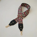 Dettaglio della tracolla larga vintage floreale con ganci dorati e fibbia regolabile - Nero Floreale