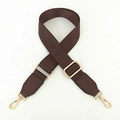 Detail of dark brown thick nylon strap with shiny gold swivel hooks and adjustment buckle - Brown