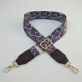 Close-up of geometric ethnic bag strap with golden metal hooks and leather accents - Grey Rhombus + Coffee Leather Trim