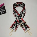 Detailed view of adjustable wide strap with red black white geometric woven pattern - Rainbow