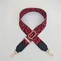 Adjustable wide shoulder strap with red leopard print webbing and gold metal hooks - Red