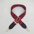 Tracolla regolabile con stampa leopardata rossa e nera e ganci in metallo dorato - Rosso