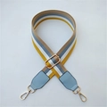 Close-up of colorful striped canvas bag strap with light blue leather ends and gold hardware - Style 3 Light Blue