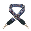 Close-up of wide woven shoulder strap with colorful ethnic geometric patterns and gold clips - Silver Clasp / Blue Rhombus + Green Leather