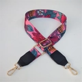 Detail of floral woven bag strap with golden metal hooks and pink tropical patterns - Silver Clasp / Red Floral with Black Trim