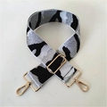 Close-up of camouflage woven shoulder strap with star patterns and gold metal buckles - Camouflage White Silver Thread