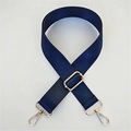 Detailed view of high-density navy blue nylon strap with gold lobster clasps and hardware - Blue
