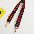 Adjustable red and black plaid canvas shoulder strap with gold metal lobster clasps - Silver Clasp / Red