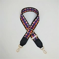 Close-up of geometric pattern strap with golden metal swivel hooks and adjustable buckle - Black Border Ethnic