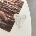 Macro detail of sparkling colorful rhinestone bow phone grip holder on an aesthetic background - Full Zirconia Bow / Iridescent / Adhesive
