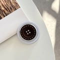 Detail of creative brown leather button phone socket stand with stitching on white desk - Magnetic Model / Chocolate