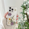 Clear iPhone case with real pressed flowers, daisies and glitter in a natural design - Elegant Purple (Real Flower) / iPhone 17 Pro Max