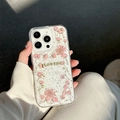Detail of transparent iPhone case featuring real pink dried flowers and gold foil accents - Real Pink Flowers / iPhone 7/8/SE 2020